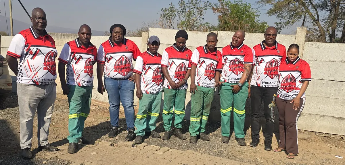 The full Thibakotse Enterprise team lined up at the yard